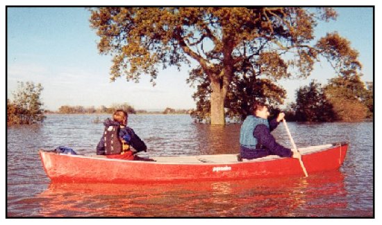 Jim & Alan paddling in a drowned landcsape!